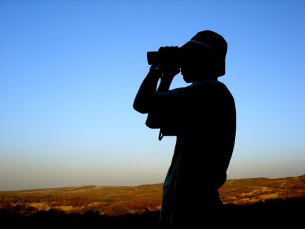 binoculars in use