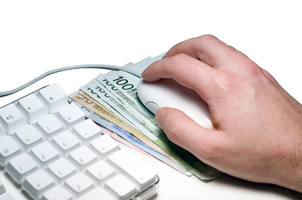 Hand with mouse over money