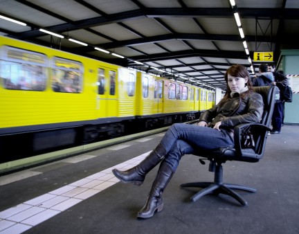 girl in chair at subway