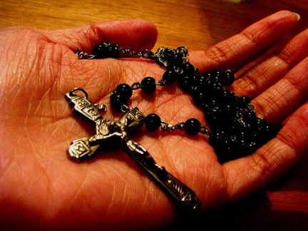 rosary in hand