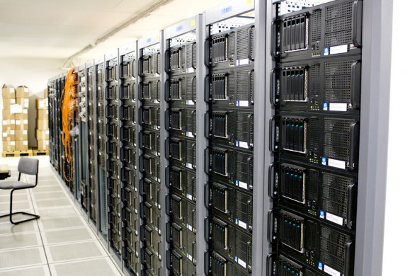 Room filled with rack-mounted servers