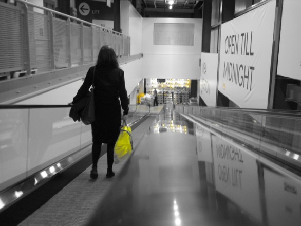 Woman with shopping bag in mall